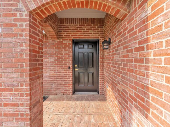 Entrance to property with brick siding | Image 4