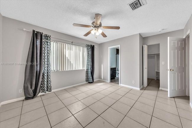 0 - 9780 W Daffodil Ln, Home with 3 bedrooms, 2 bathrooms and null parking in Miramar FL | Image 34