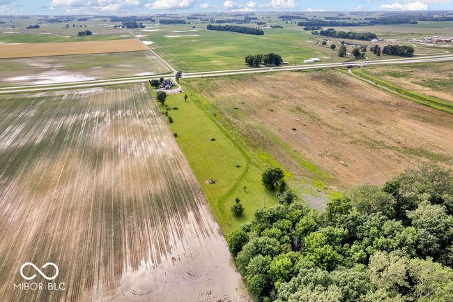 view of rural area featuring rows of crops | Image 55