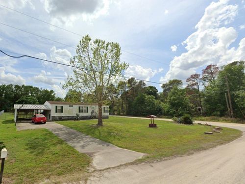 711 Park Rd, Mascotte, FL, 34753-2044 | Card Image