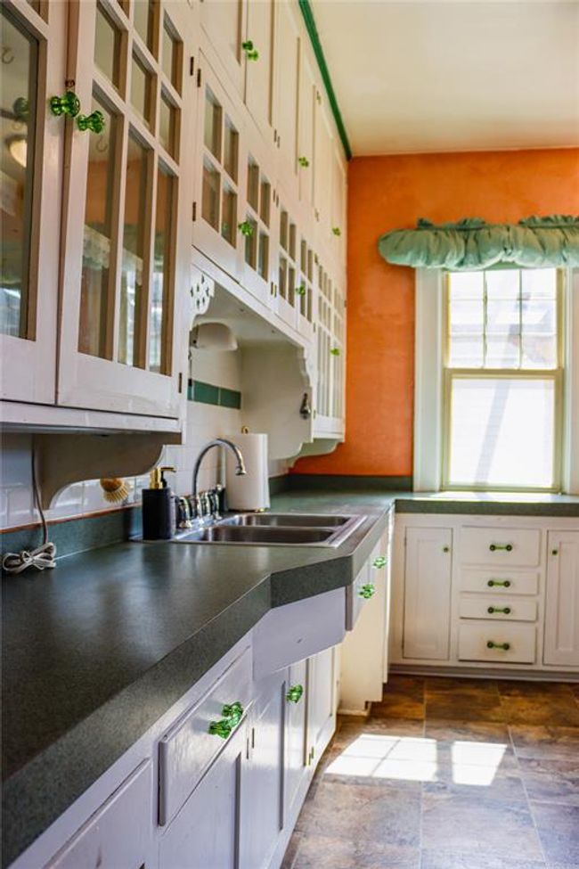 Unique farmhouse style cabinetry, and plenty of sunlight | Image 18