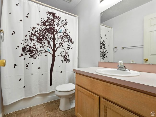 Full bath featuring vanity and tile patterned flooring | Image 18