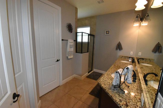 709 Calabria Way, House other with 3 bedrooms, 3 bathrooms and null parking in HOWEY IN THE HILLS FL | Image 15