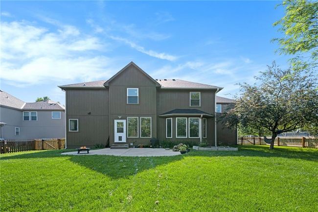 Rear view of property with a patio and entry steps | Image 33