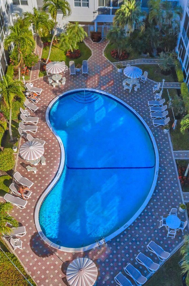 JUST LISTED, A BEACH & BOATERS LOVERS DREAM!!.. PRIVATE DEEDED BEACH ACCESS ACROSS THE STREET AND NEW BOAT DOCK TO LIVE THE LIFESYTLE OF LAUDERDALE BY THE SEA. THIS HIGHLY DEMANDED 2 BEDROOM 2 BATH UNIT FEATURES THE PERFECT LOCATION IN A WELL MANAGED AND FINANCIALLY SOUND COMPLEX WITH ALL CERTIFICATIONS COMPLETED. THE UNIT OFFERS ALOT OF UPDATES, HIGH IMPACT DOORS, WINDOWS, NEWER AC AND HOT WATER HEATER AS WELL AS A NICE SUNROOM OFFERING PLUSH BOTANICAL GARDEN & POOL VIEWS. | Image 9