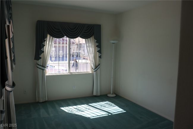 Empty room with carpet flooring | Image 36