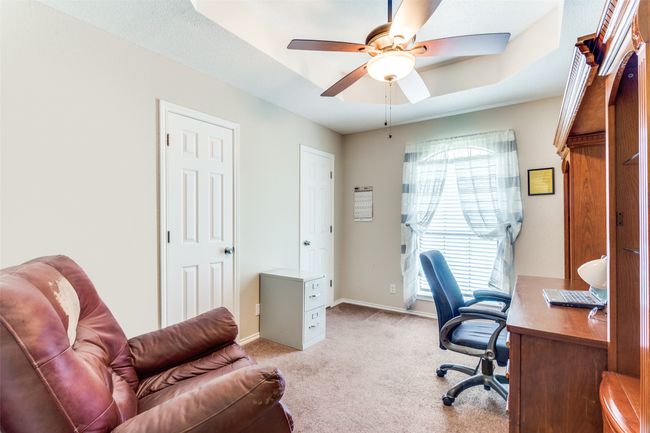 Second bedroom is being used as an office | Image 20