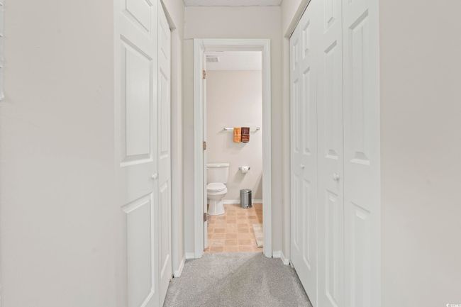 Corridor with baseboards and carpet flooring | Image 15