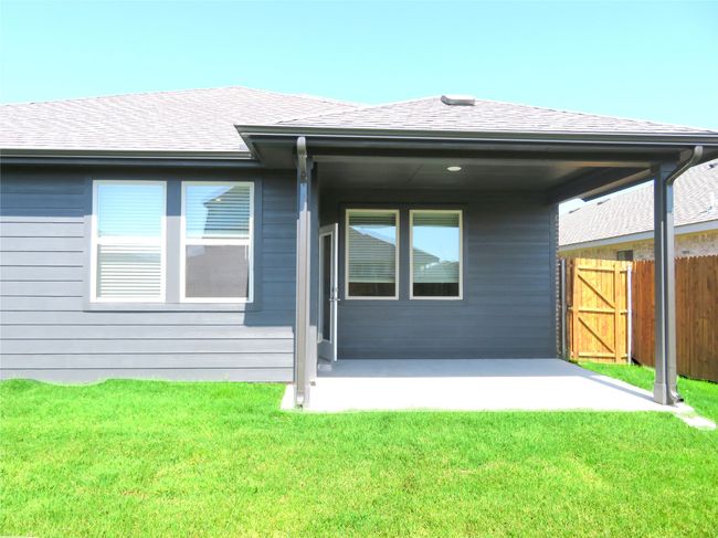 Covered patio in the east facing back yard | Image 19