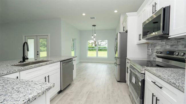 12323 Genter Dr, House other with 4 bedrooms, 2 bathrooms and null parking in Spring Hill FL | Image 10