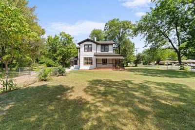 Back of house with a lawn | Image 2