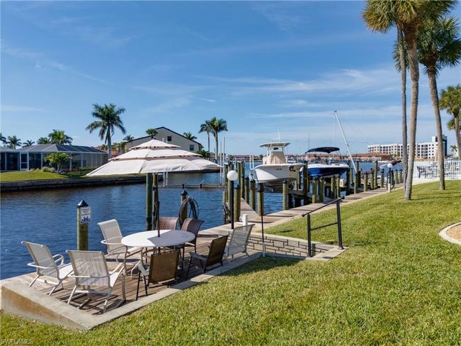 View of dock with a lawn and a water view | Image 22
