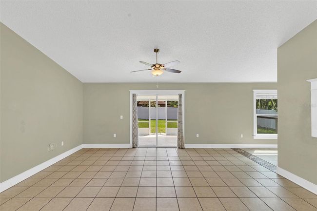 3013 Hunkin Cir, House other with 3 bedrooms, 2 bathrooms and null parking in DELTONA FL | Image 4