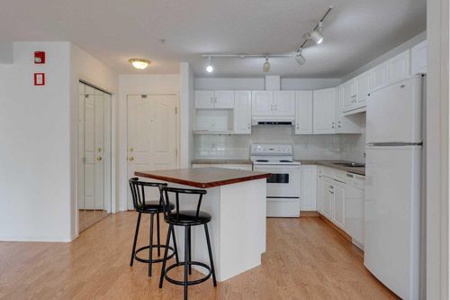 210-165 Manora Place Ne, Calgary, AB, T2A7X5 | Card Image
