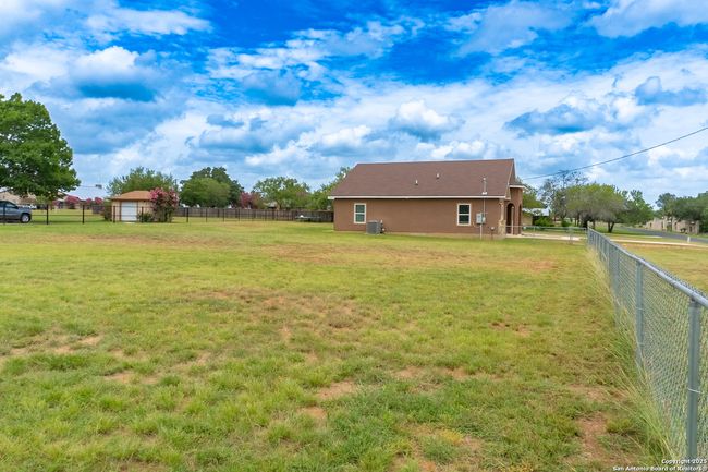 Side yard extension within fenced area | Image 29