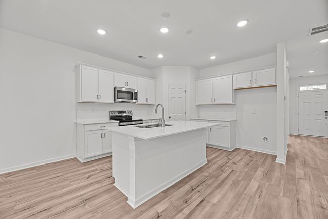 Kitchen is equipped with Quartz countertops | Image 13