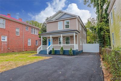 View of front facade featuring a porch | Image 2