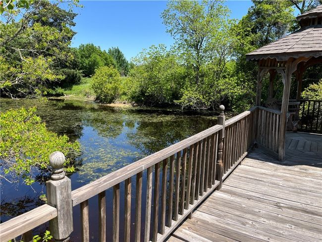 Dock area with water view and a gazebo | Image 13