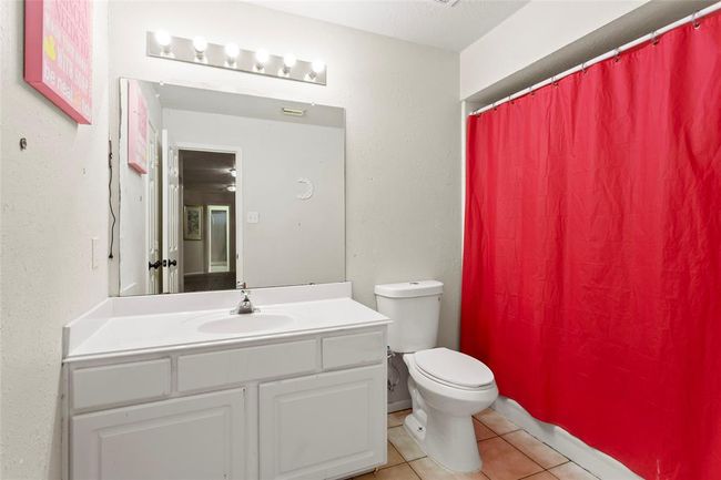 Full bath with shower/tub combo, has storage closet, located between bedrooms 3 and 4 | Image 35