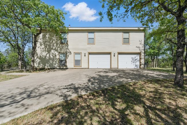 The house has an extra large double bay garage. | Image 27