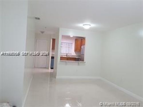202-6061 Shakerwood Cir, Tamarac, FL, 33319-2365 | Card Image