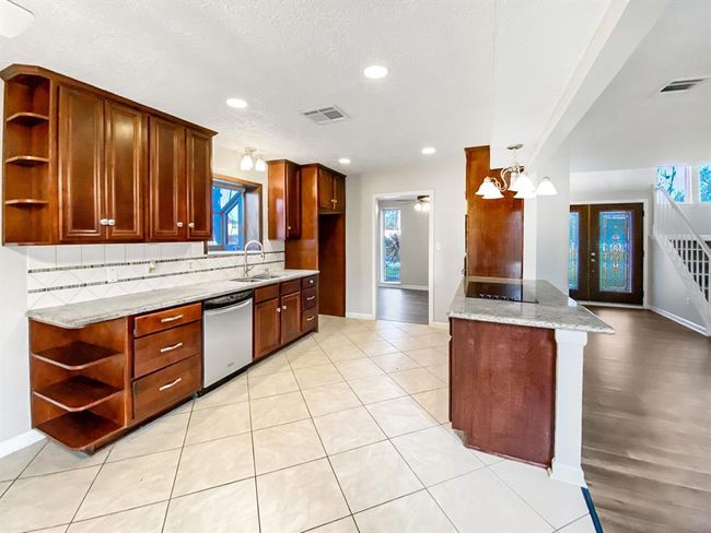 Beautiful kitchen open to the living room | Image 9