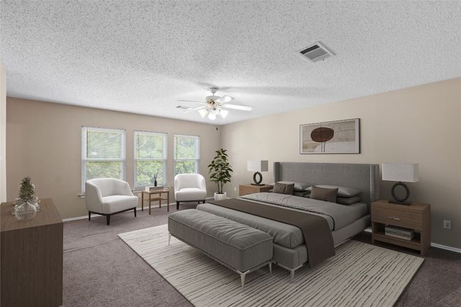 Carpeted bedroom featuring a textured ceiling, ceiling fan, and baseboards | Image 18