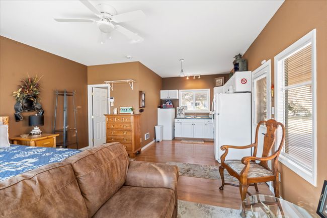 Cottage with full bathroom and kitchen area. | Image 88