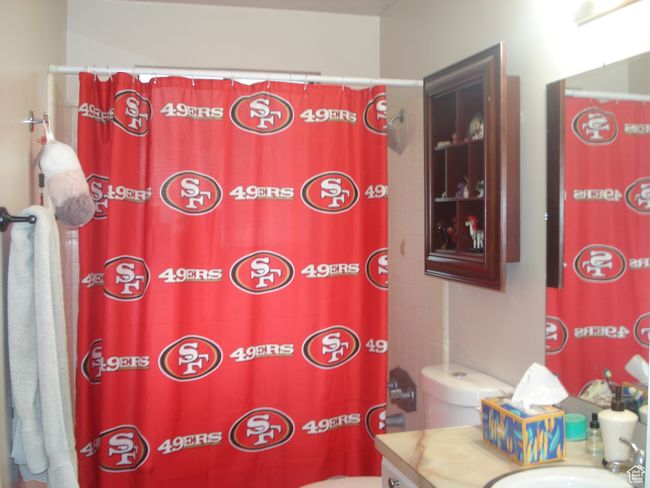 Full bath featuring vanity and a shower with shower curtain | Image 14