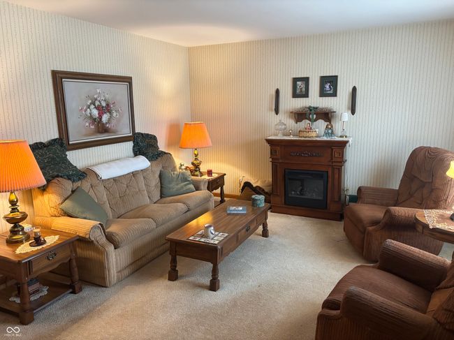 living room with carpet flooring | Image 4