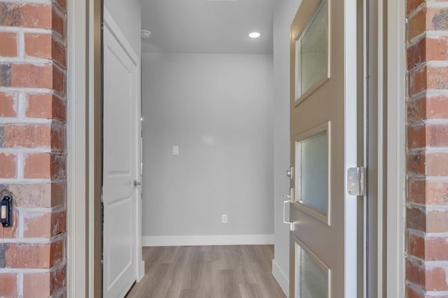 Corridor with recessed lighting, baseboards, and wood finished floors | Image 5