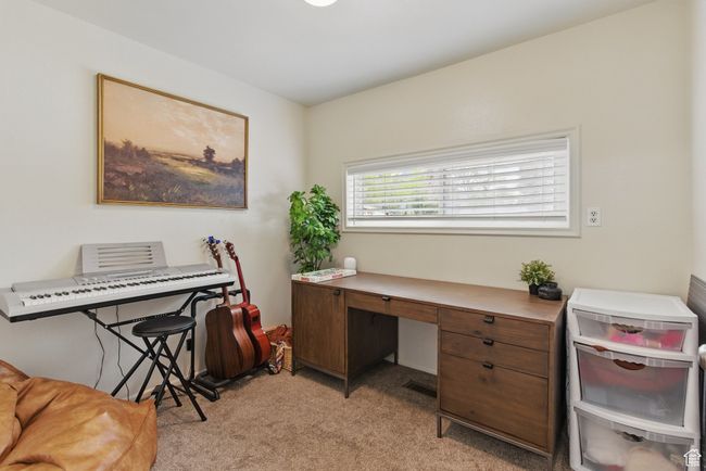 Office space with visible vents and light carpet | Image 11
