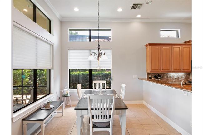 Breakfast bar with beautiful golf course views. | Image 11
