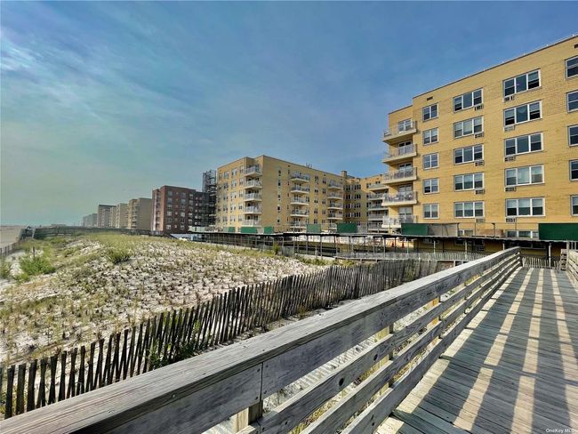 Ramp Leading To Beach From Building | Image 21