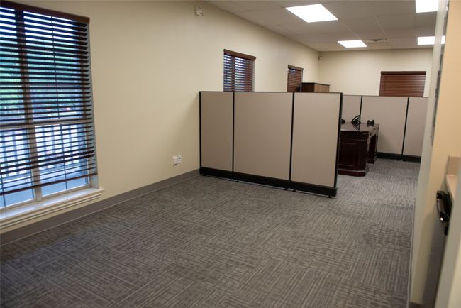 Spare room with baseboards, carpet, and a drop ceiling | Image 23