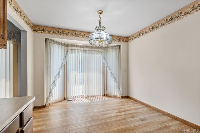 Dining can be formal or informal w/doorwall to deck | Image 9