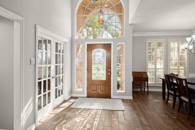 Sunlight filters from the front to the back of the home. And you'll LOVE the continuous flooring. | Image 6