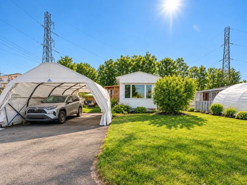 1018 Rue Alainbourg, Lévis, QC, G6Z1W9 | Card Image
