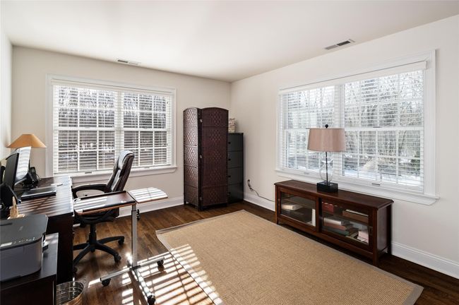 Office area in Primary suite featuring dark hardwood flooring, plenty of natural light. | Image 20