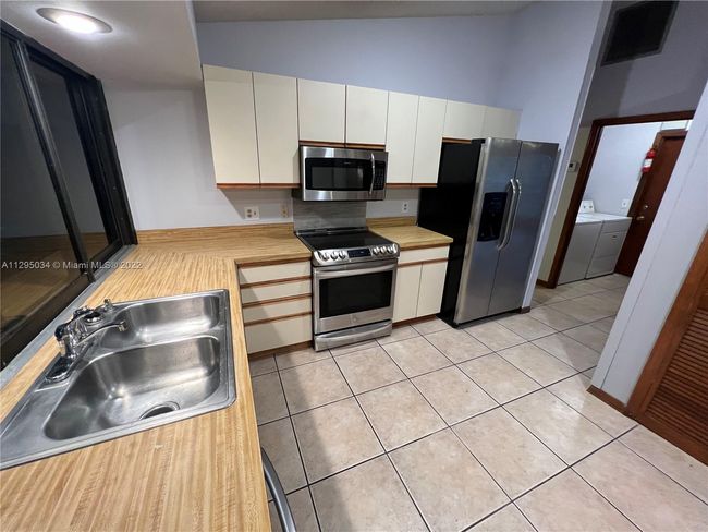 1921 Sw Hickock Ter, House other with 3 bedrooms, 2 bathrooms and null parking in Port St. Lucie FL | Image 4