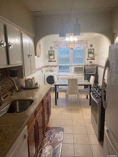 60-17 44th Ave, Woodside, NY, 11377-4957 | Card Image