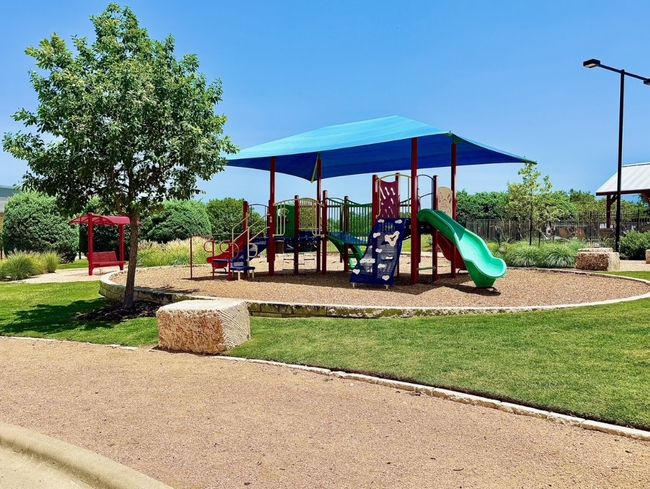 Community play area with a yard | Image 38