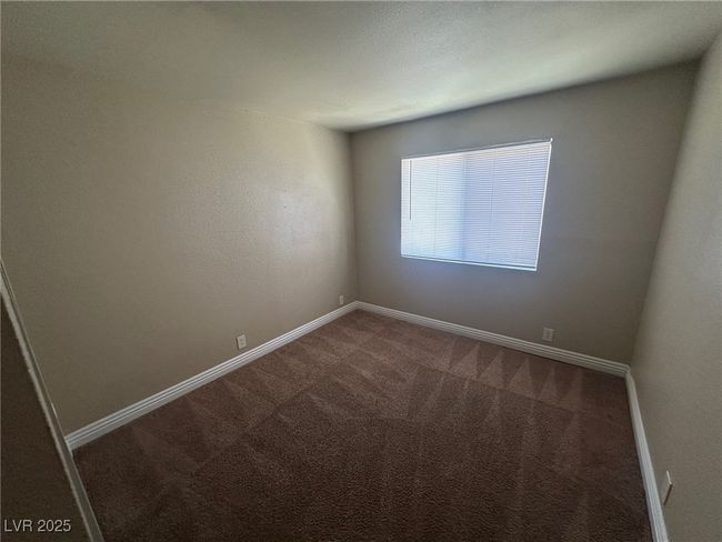 Empty room with baseboards and carpet flooring | Image 15