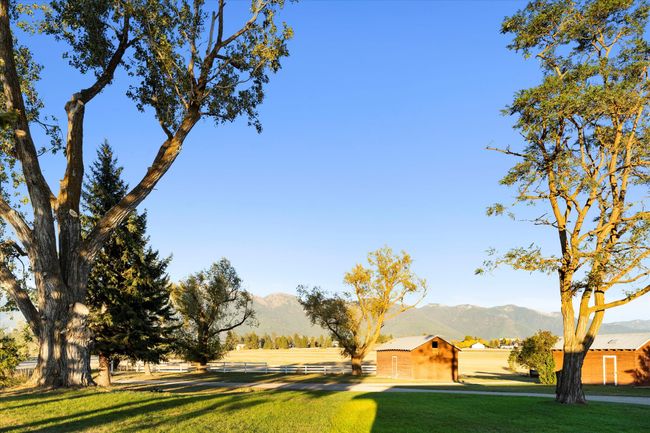 View of home's community with a yard and a mountain view | Image 44