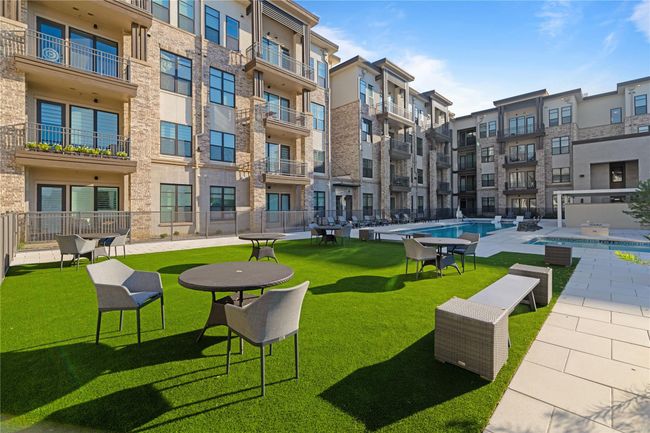 Surrounding community featuring a pool and a yard | Image 31