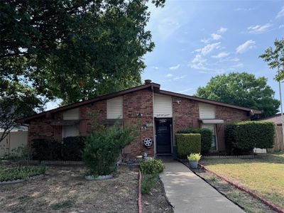 Single story home with a front yard | Image 1