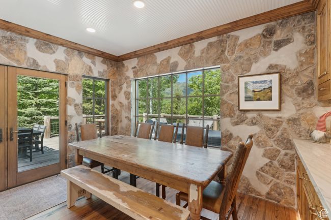 Dining space featuring light wood-style floors and recessed lighting | Image 10