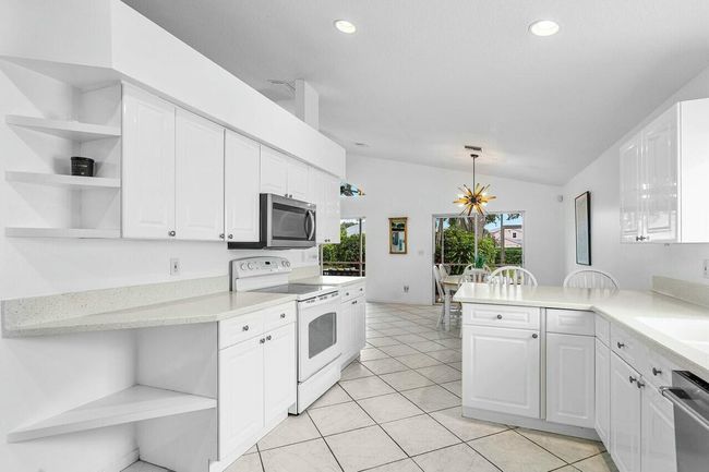 1643 Oak Berry Cir, House other with 3 bedrooms, 2 bathrooms and null parking in Wellington FL | Image 4