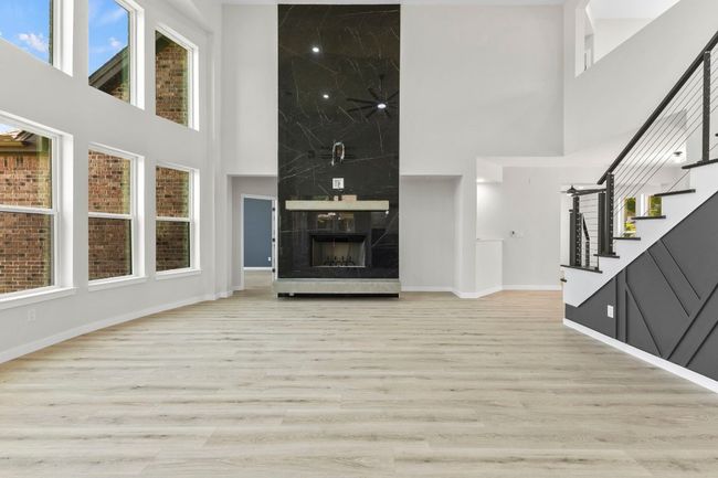 Amazing floor to ceiling fireplace. Everything is new! | Image 4