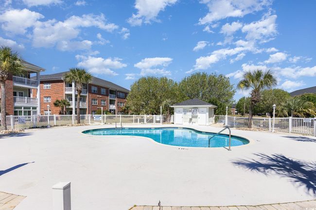 Pool featuring a patio area and fence | Image 25